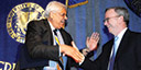 Dean Sastry congratulates Eric Schmidt